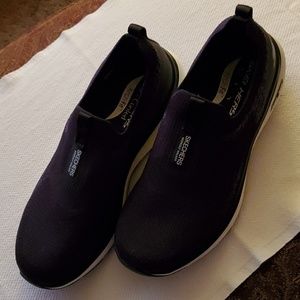 Skechers slip on athletic sneakers, size 8.5 black and white